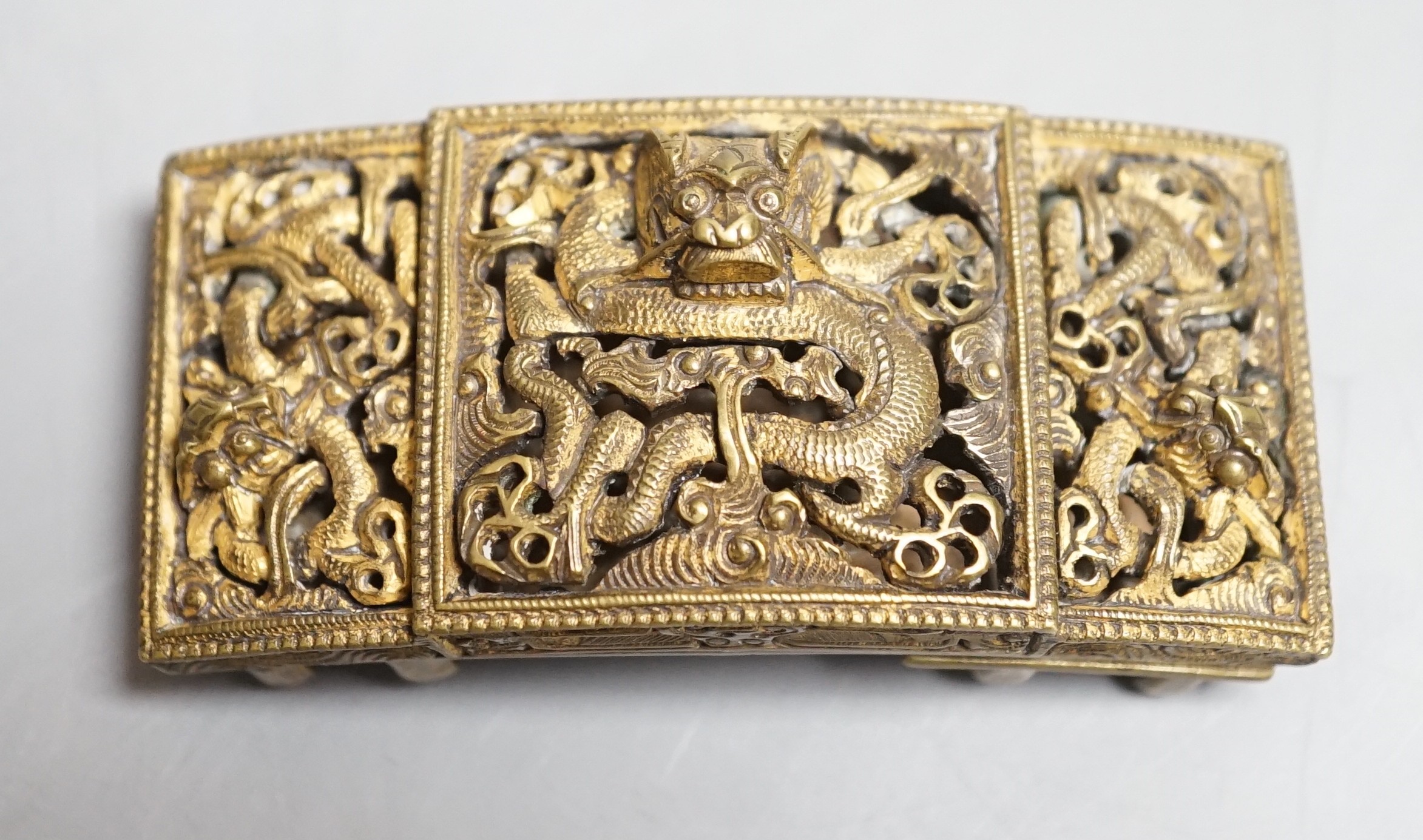 A Chinese gilt bronze ‘dragon’ belt buckle, 19th century